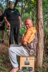 Chairman of the Te Whanau a Rangiwhakaahu Hapu Trust Aperahama Edwards looks on with kaumatua Charlie Mackie holding kiwi Te Wairoa. Kiwi Coast